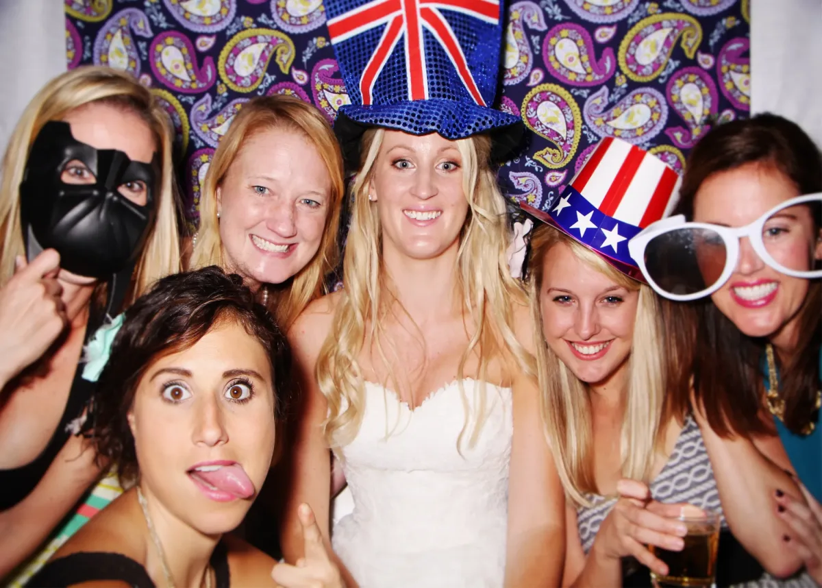 ShutterHutch Photo Booths + Films, selected for the 2026 Charlotte wedding guide
